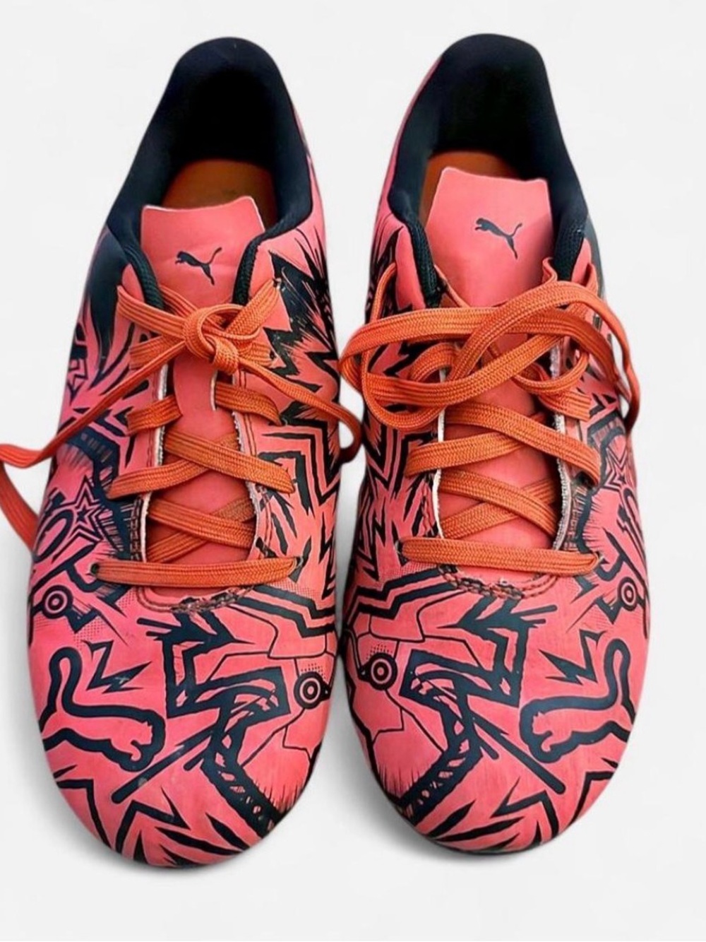 Puma Men’s Coral-Orange Soccer Cleats with Black Graphic Print